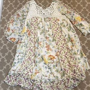 Gorgeous Free People mini dress - size small. Floral and flowing. So beautiful.